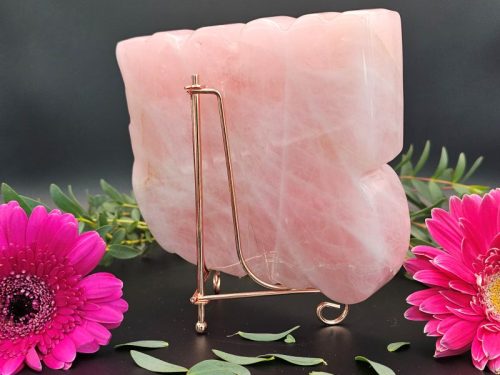Back view of Horse Girl carving showing the rose-gold display stand